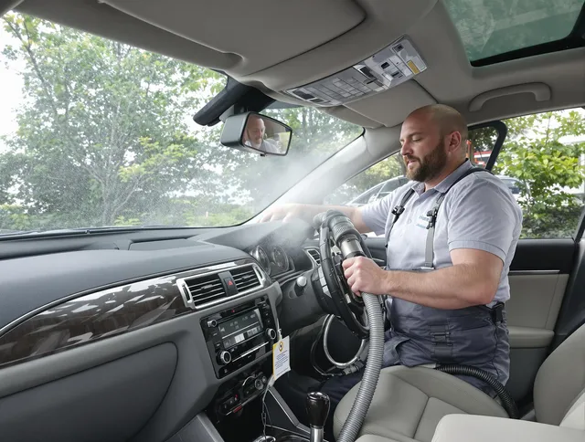 Hopkinton Air Duct Cleaning specialist performing professional car duct cleaning in Hopkinton